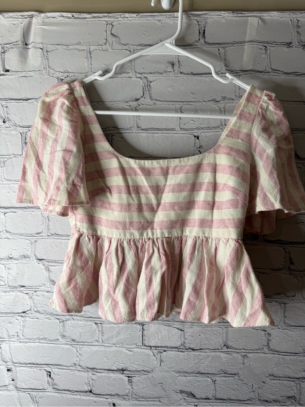 Zara Women's Pink and Cream Striped Peplum Top